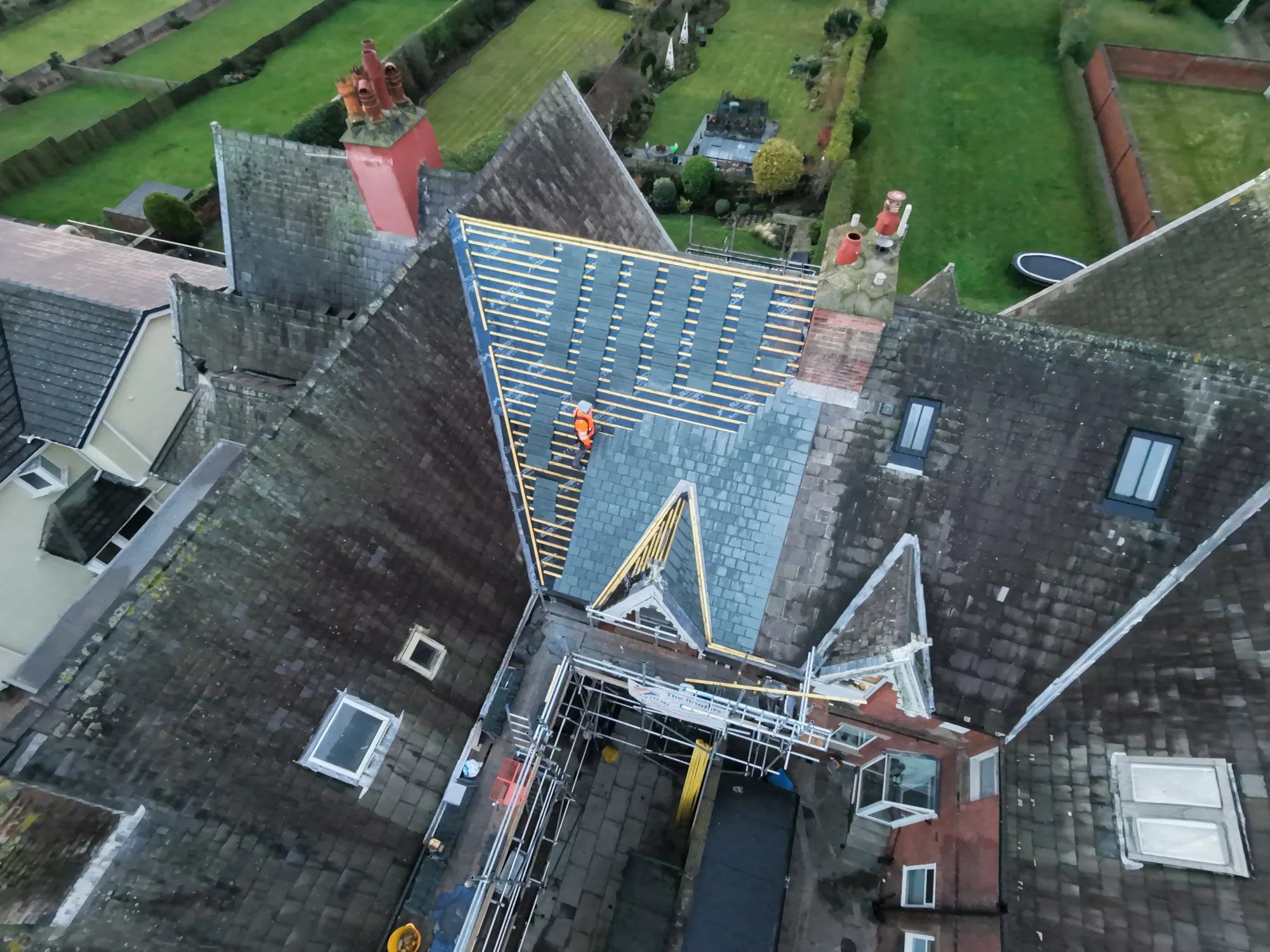 New slate covering on an exposed Fylde Coast roof near Lytham St Annes